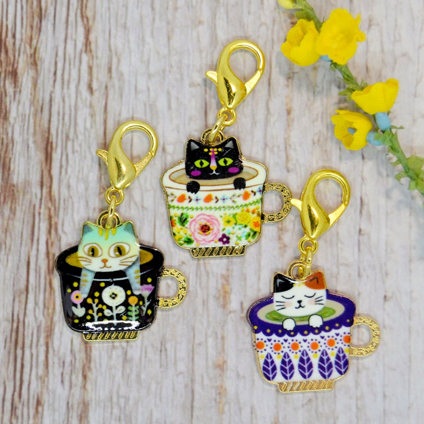 Adorable set of 3 romantic, enamelled stitch markers or progress keepers depicting cheeky cats in mugs