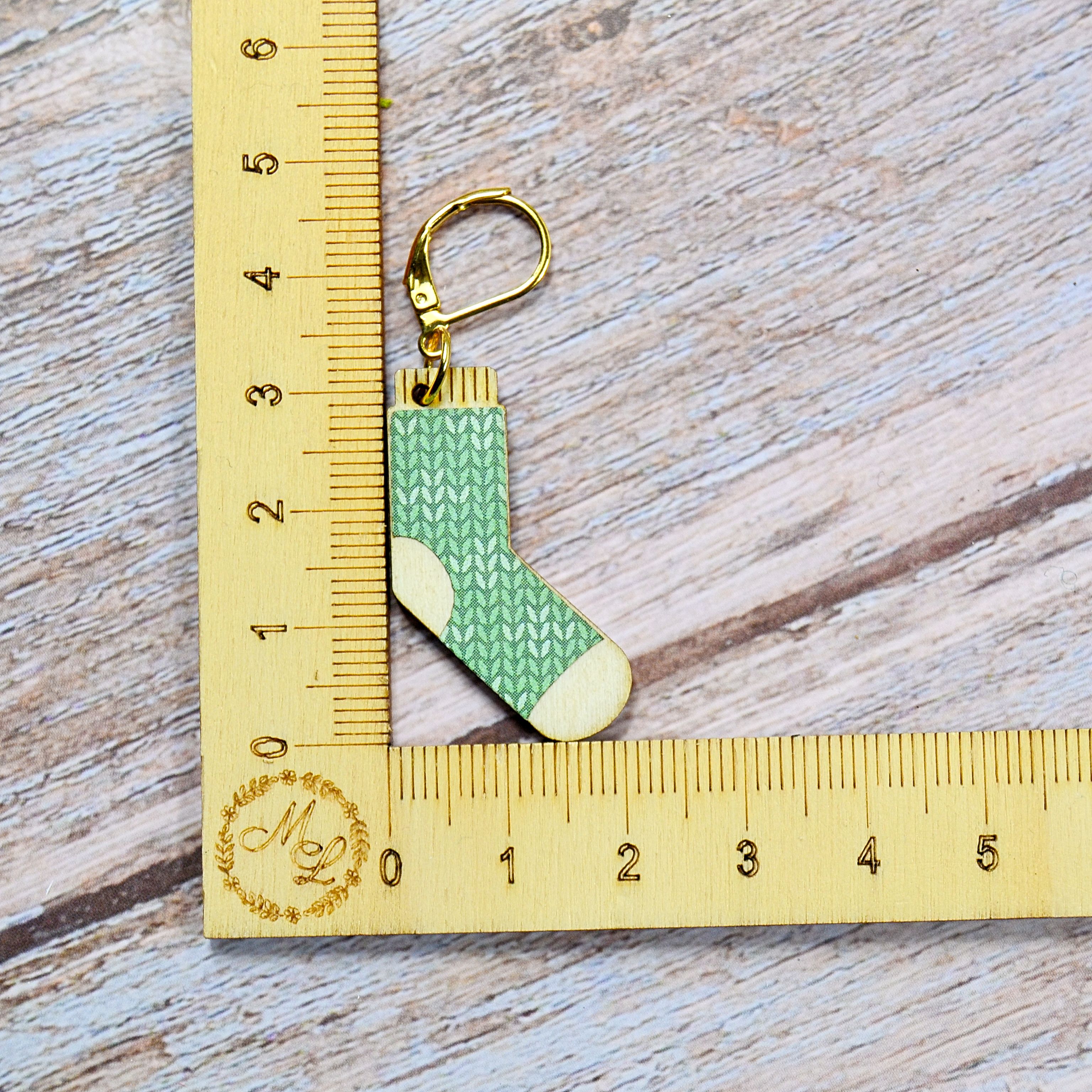 Holzmaschenmarkierer Wollsocke an Lineal